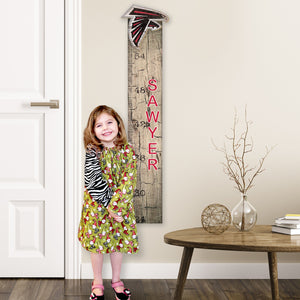 Personalized NFL Growth Chart in Livingroom with littler girl